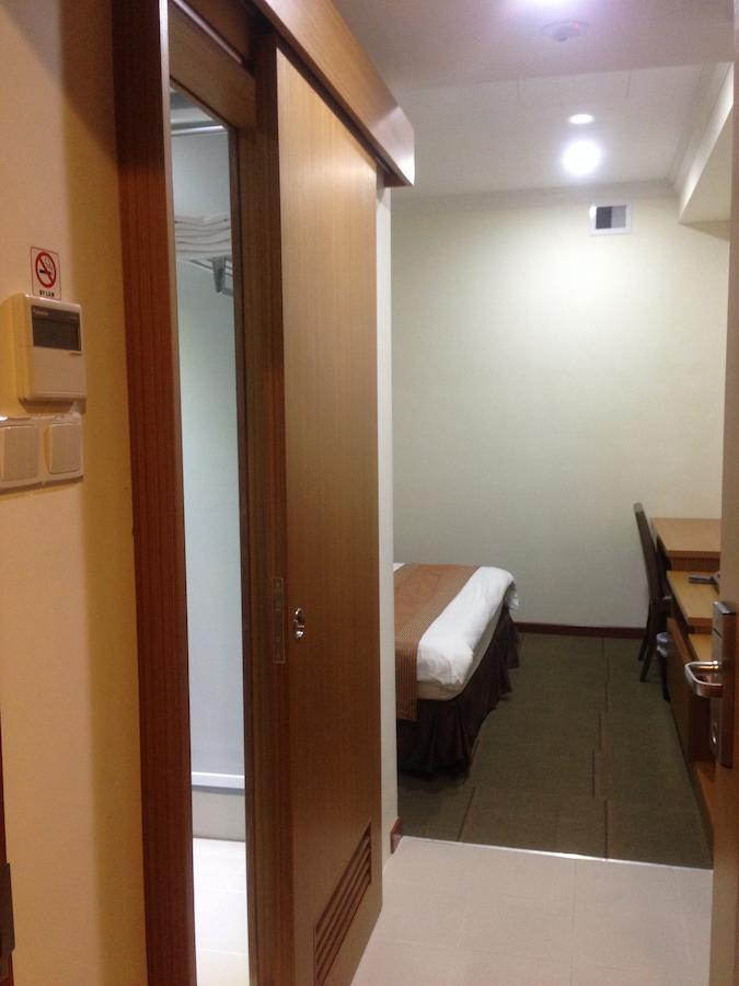 New Cape Inn Singapur Habitación foto