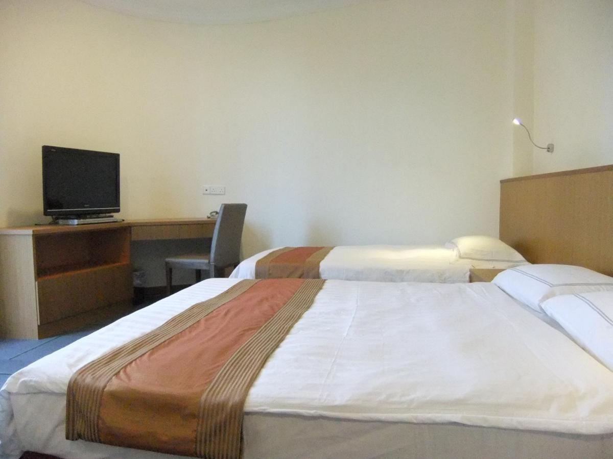 New Cape Inn Singapur Habitación foto
